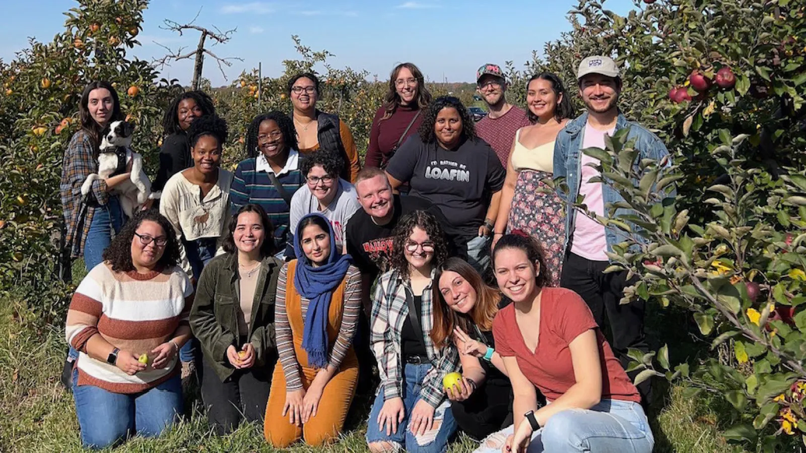 Graduate students at an apple farm