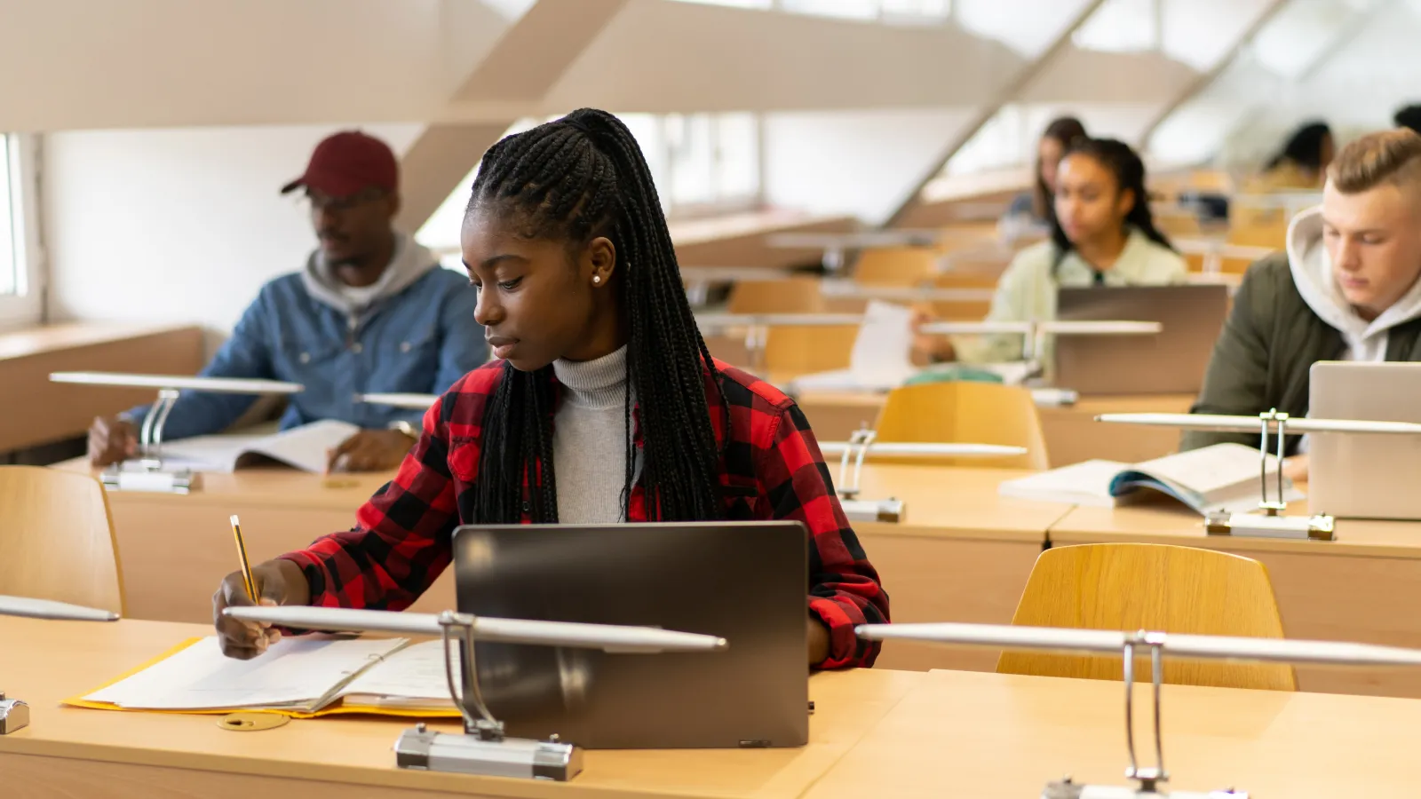 4 students working in a classroom