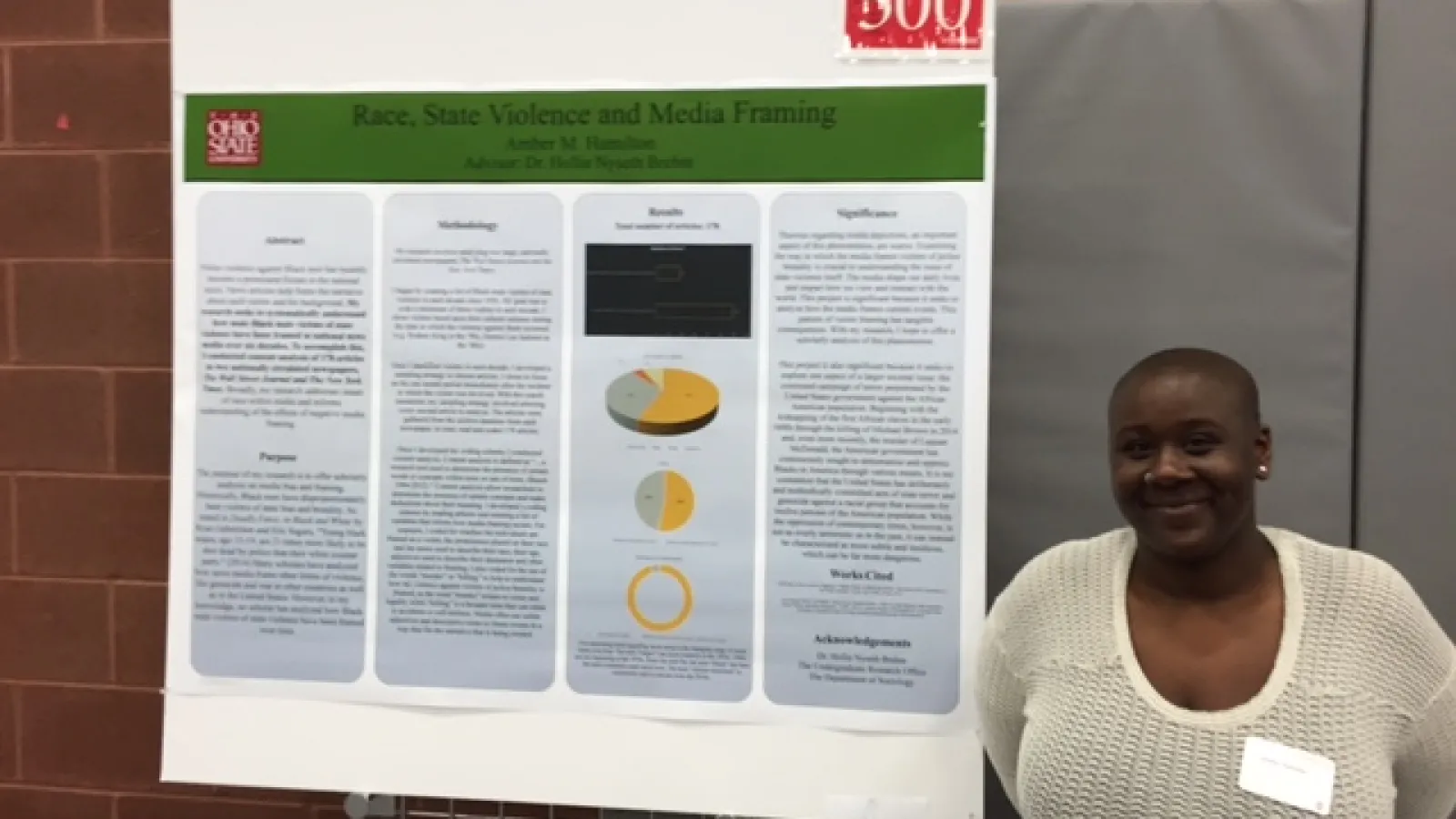Photo of Ms. Hamilton with her research presentation